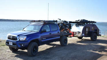 tc teardrop trailer behind a toyota tacoma