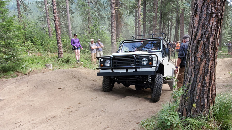 navigating the overland course at northwest overland rally in a land rover defender truck